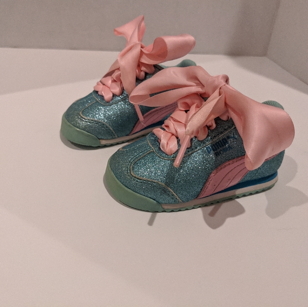 Blue and pink glittered pumas